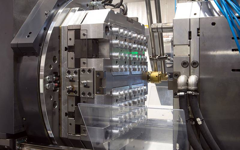 a large machine with persony metal parts